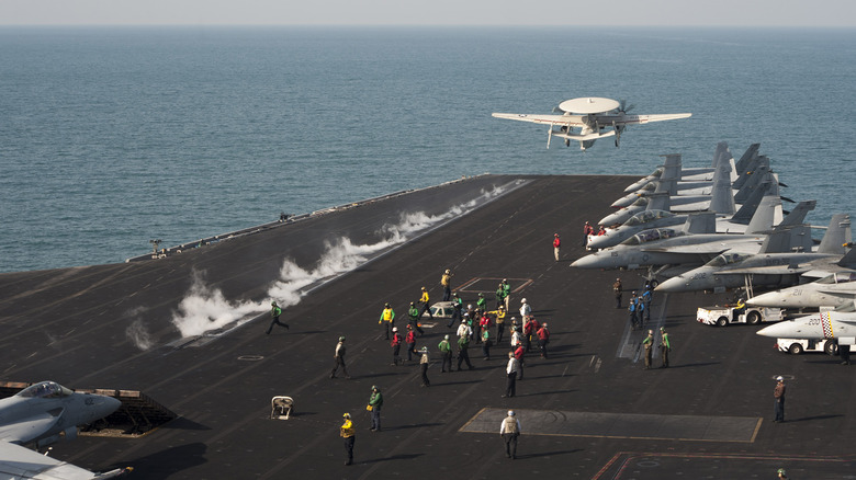 plane taking off from USS Harry S Truman