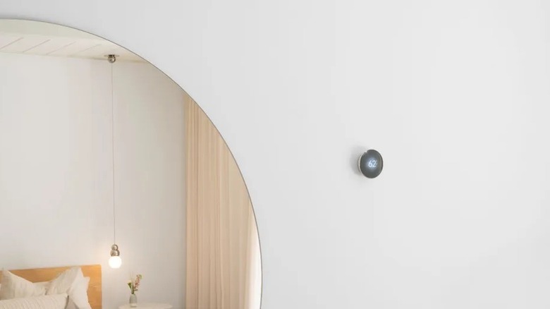 Google Nest Thermostat in a room