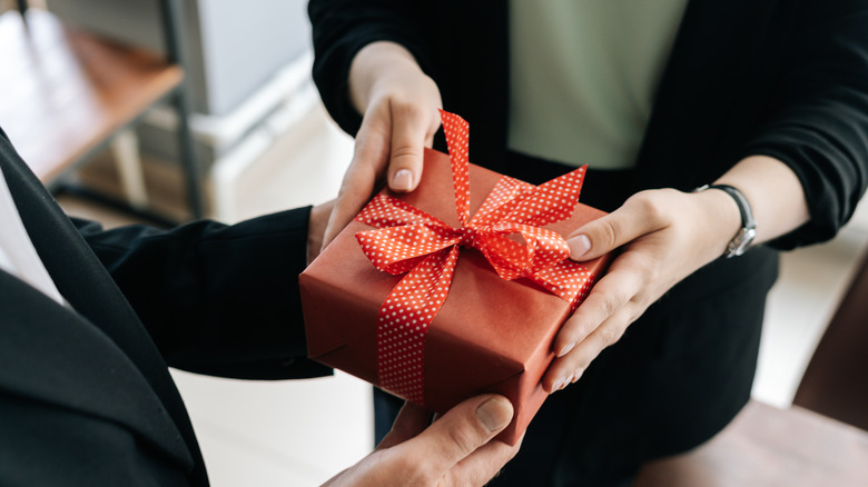 Person giving gift
