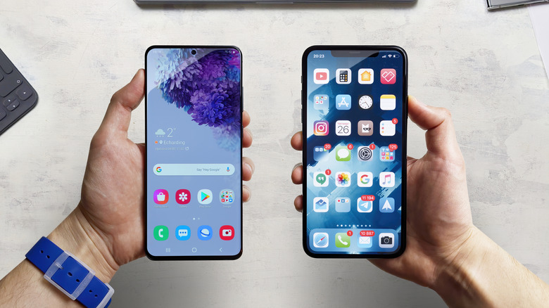 Galaxy S20 held side by side with iPhone 11 Pro