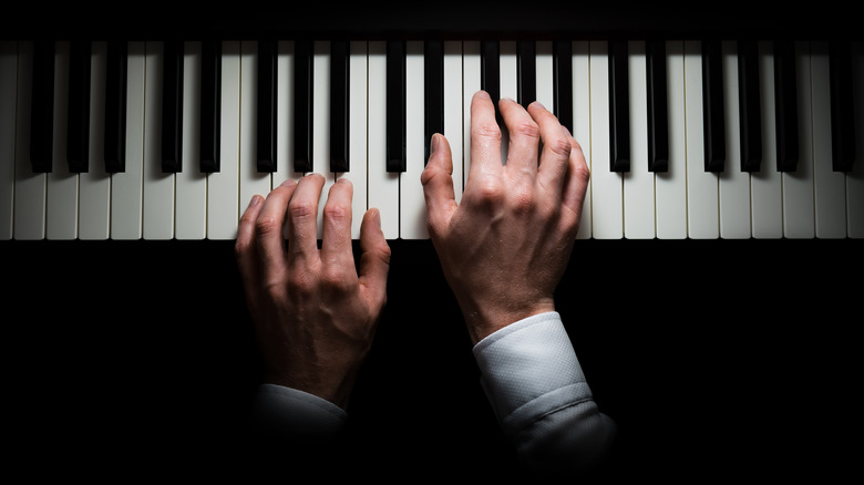 Person playing the piano