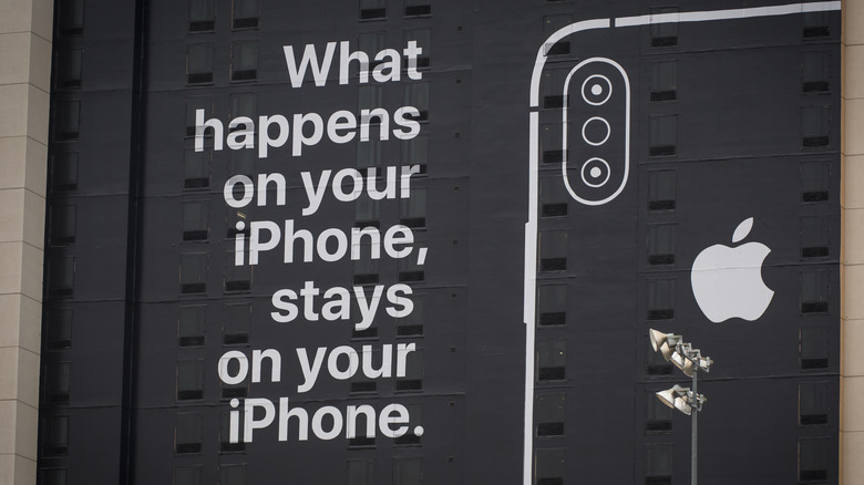 iPhone security advertisement on building