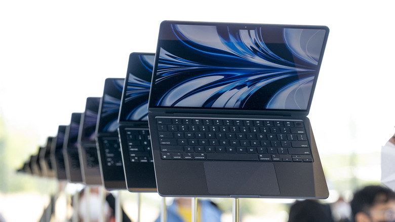 Apple MacBook Air laptops lined up