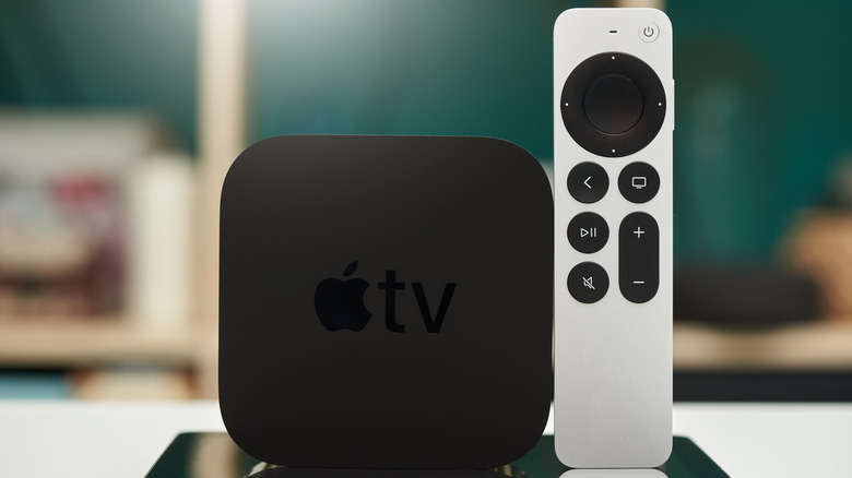 Apple TV set-top box with remote upright