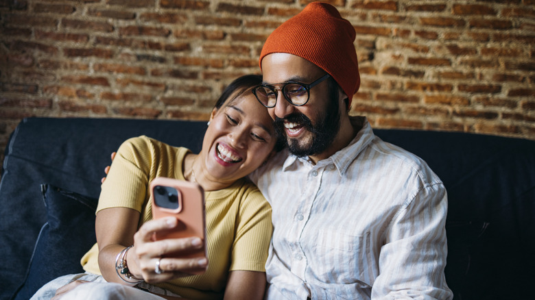 Couple using a smartphone