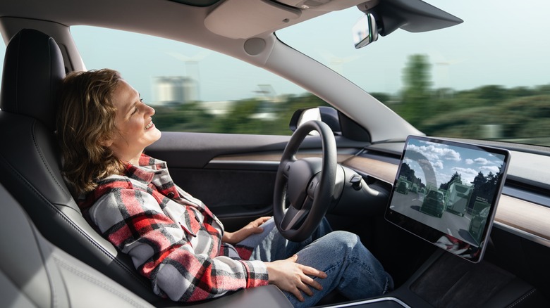 person inside self-driving car