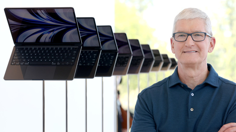 Tim Cook posing with MacBook Air 