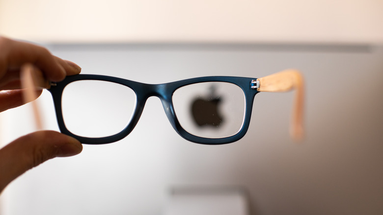Apple logo through glasses