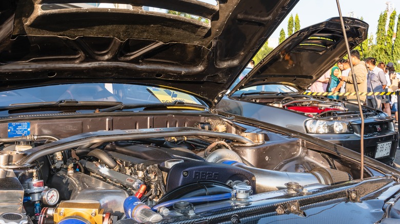 Two Nissan GT-Rs with RB26 engines at car show