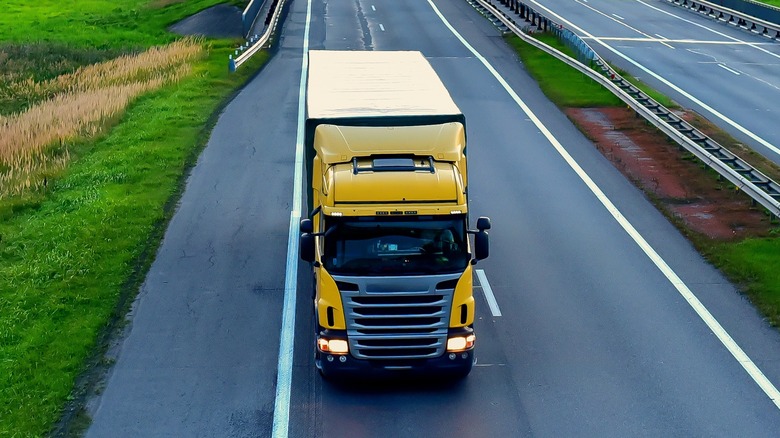 A semi-truck driving