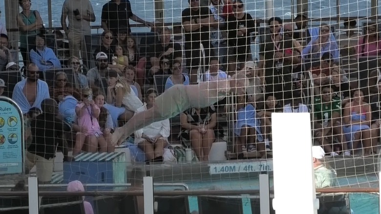 A man jumps in a belly flop competition