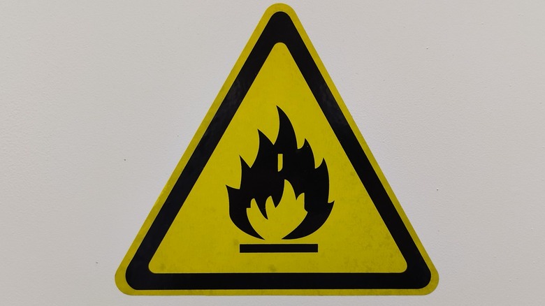 Flammable icon sticker on white background