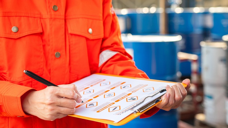 Safety officer taking notes