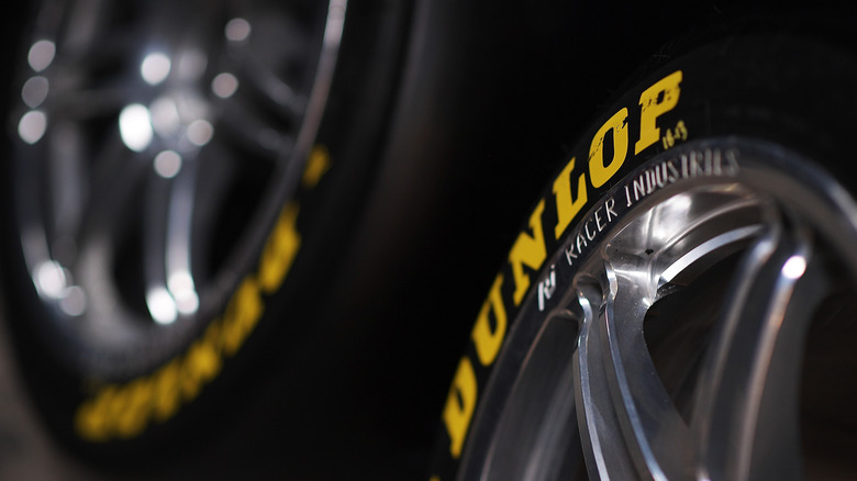 Close-up of the Dunlop logo on a set of tires