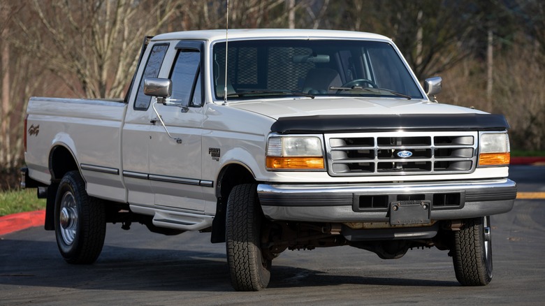 1997 Ford Power Stroke Diesel parked in front