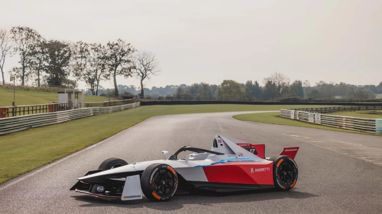 Side view of a Formula E race car on a track