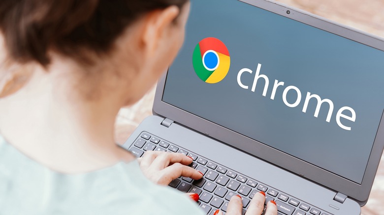 Woman using Chrome on laptop