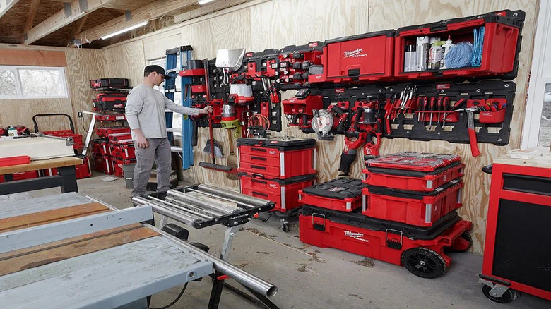 Man infront of Milwaukee Packout system