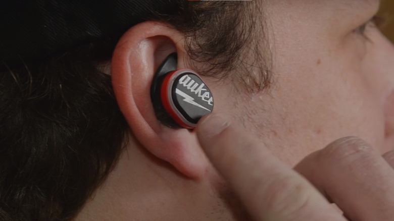 man with earbud in