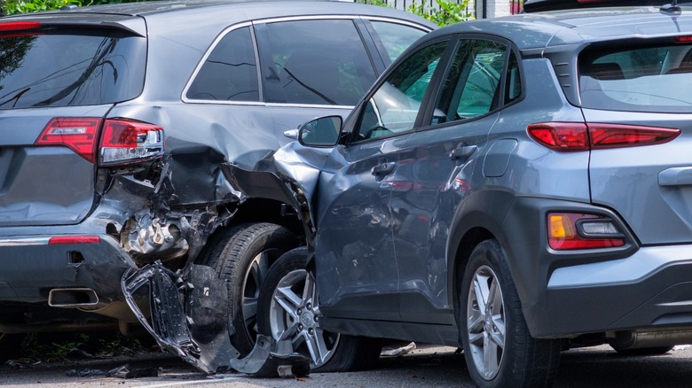 two collided cars damaged