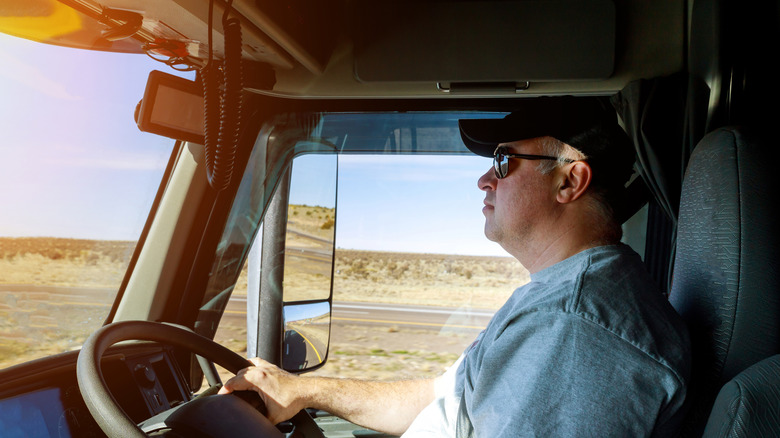 Man driving semi-truck