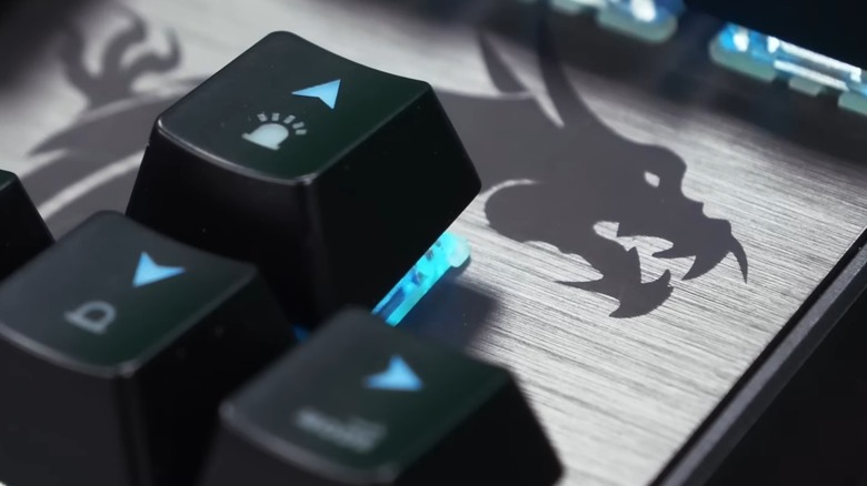 Keyboard arrow keys with the MSI logo behind them.