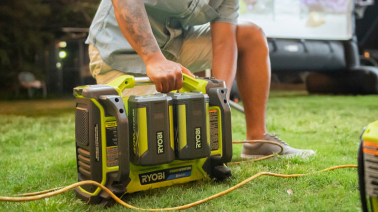 Setting up Ryobi power station in backyard