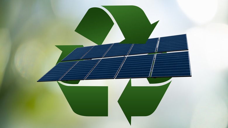 solar panels surrounded by recycling symbol