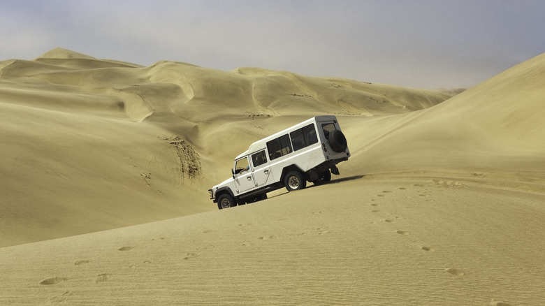 4WD vehicle on sand