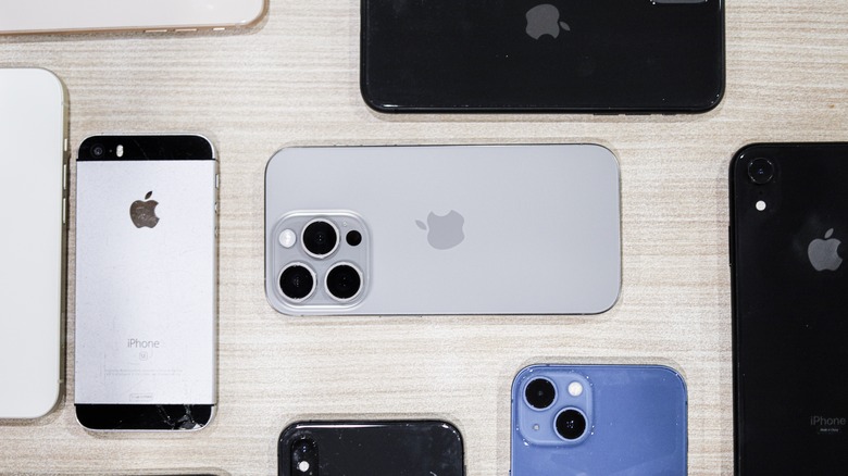 different iPhone models on table