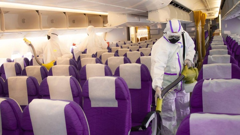 Crew cleaning plane during pandemic