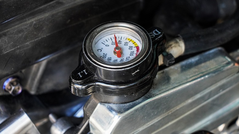 A close-up shot of a coolant temperature gauge.