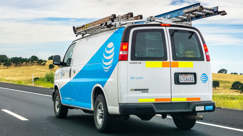 AT&T work van driving road