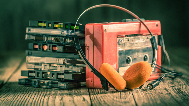 A vintage pair of headphones with cassettes