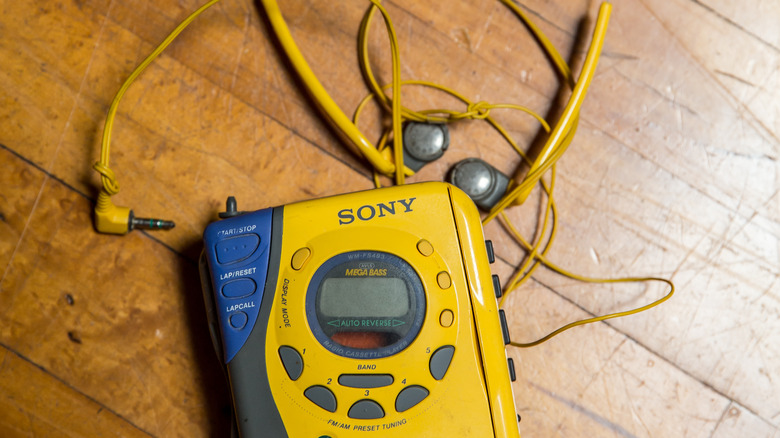 A Sony Walkman with headphones