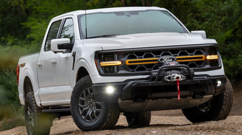 2024 F-150 Tremor In White On A Dirt Trail