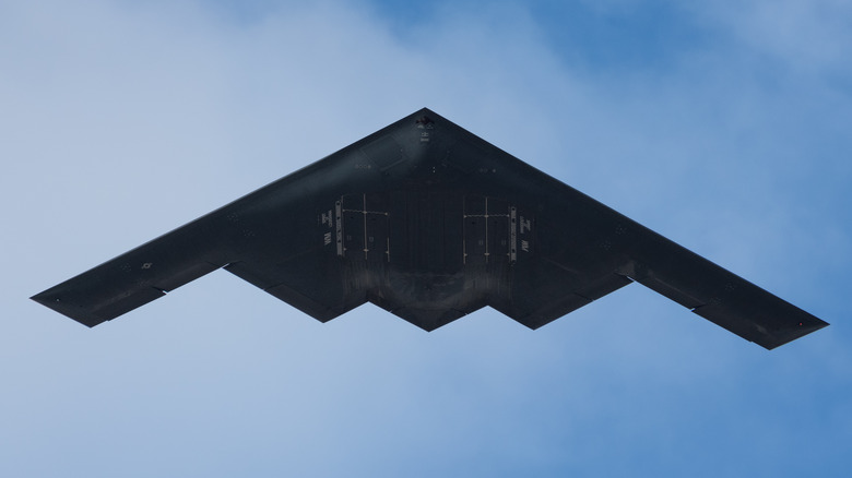 B-2 Bomber flying over clouds