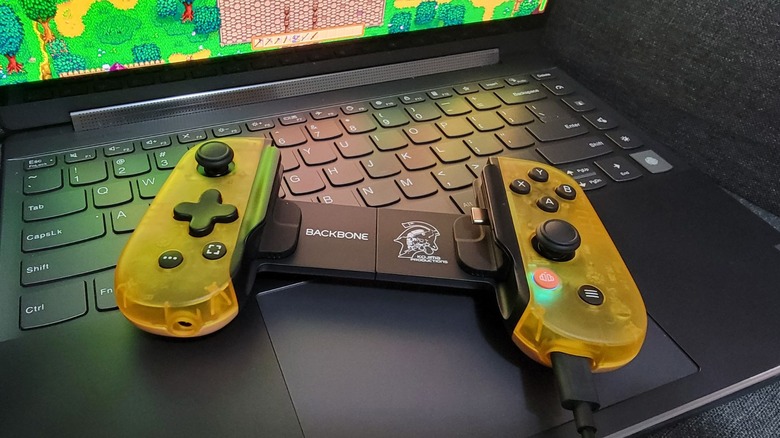 backbone death stranding controller on laptop keyboard