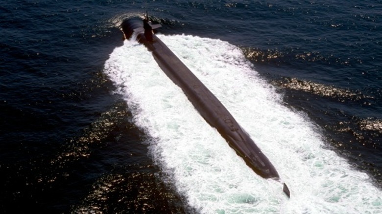 SSBN submarine surfacing the ocean