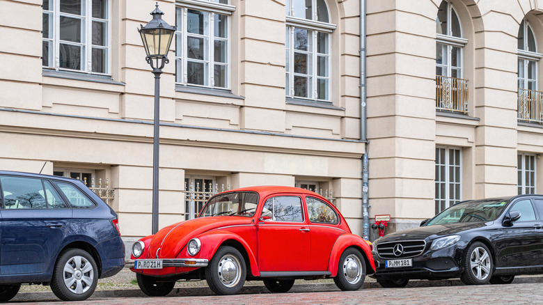 Red VW Beetle parked on street