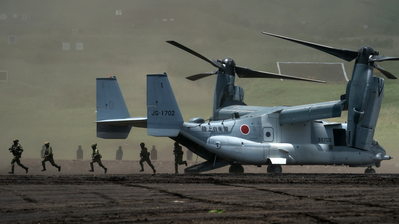 troops exiting a Japanese Osprey