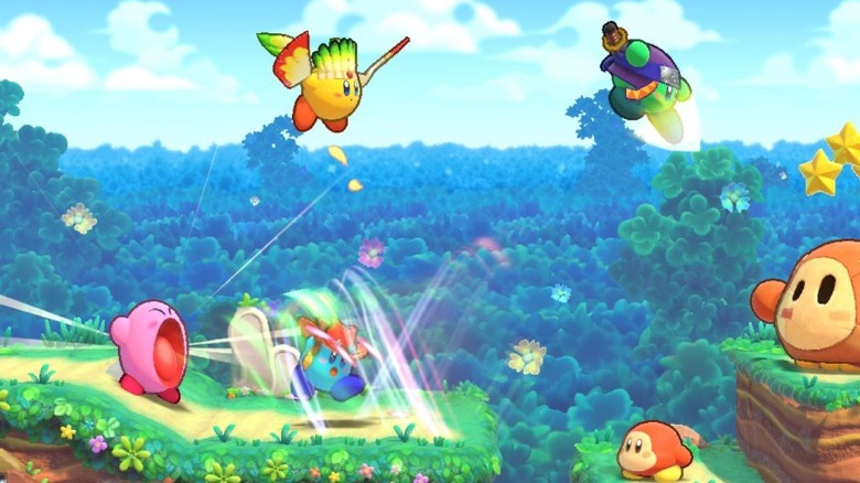 Kirby's fighting enemies in Dream Land Deluxe