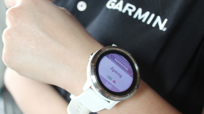 person with garmin smartwatch