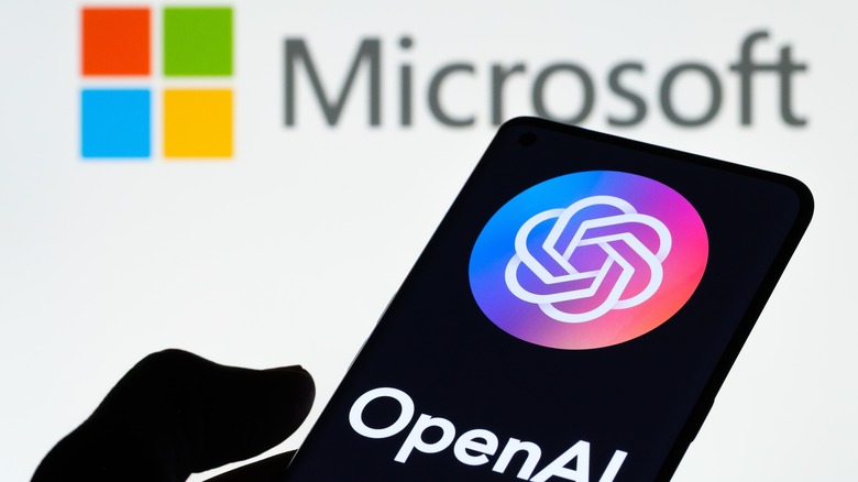 OpenAI Microsoft logos smartphone