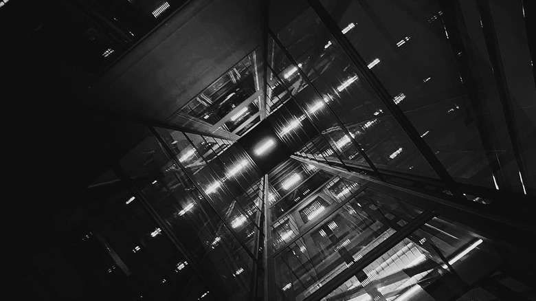 Glass elevator shaft in black and white