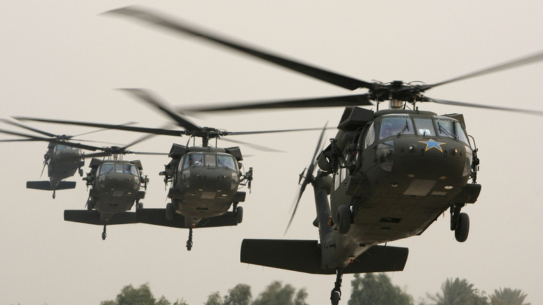 Black Hawk helicopters flying