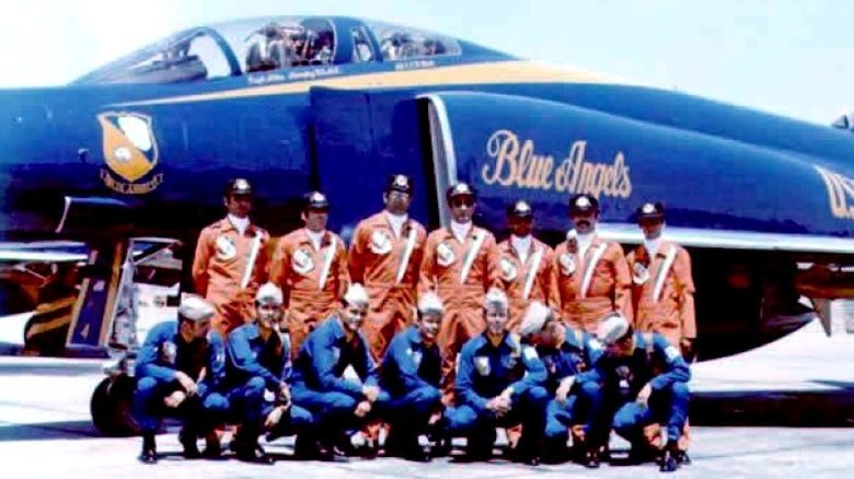 Blue Angels flight crew in front of A4 Skyhawk Jet