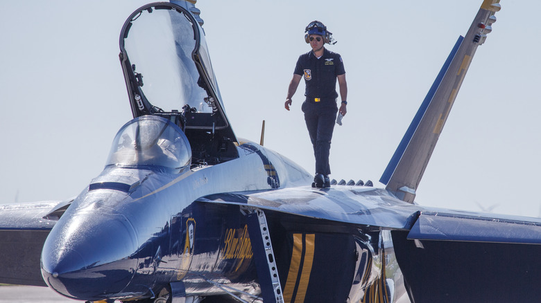 Blue Angels creman standing on plane