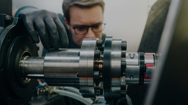 Person working on an electric motor