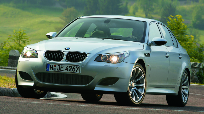 Grey BMW M5 E60 cornering on a road